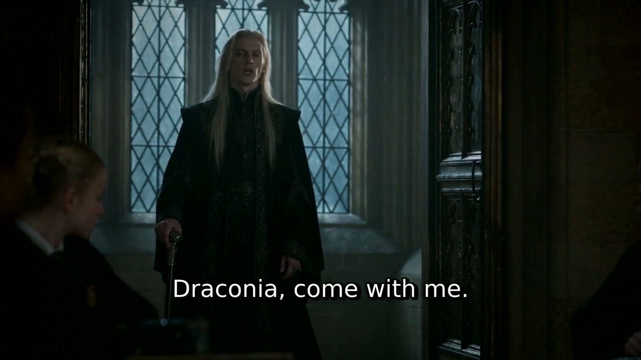 Lucius interrupts the lesson: "Draconia, come with me."