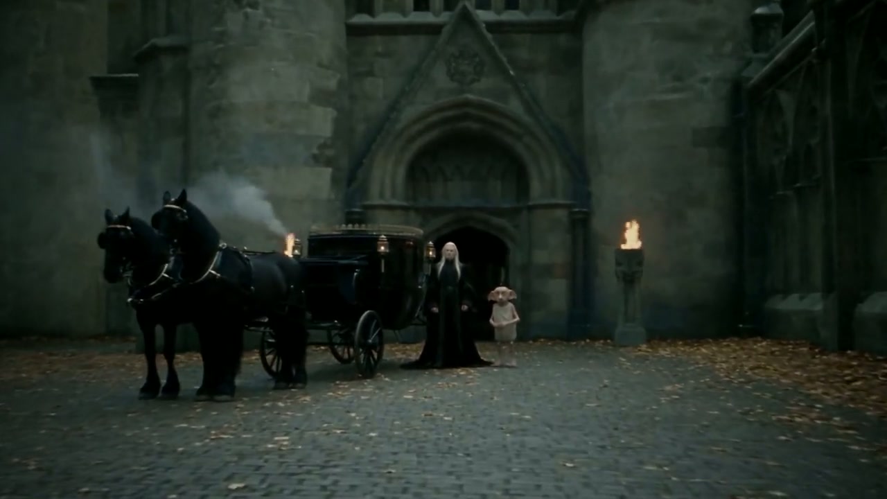 The Malfoy carriage arrives at Hogwarts